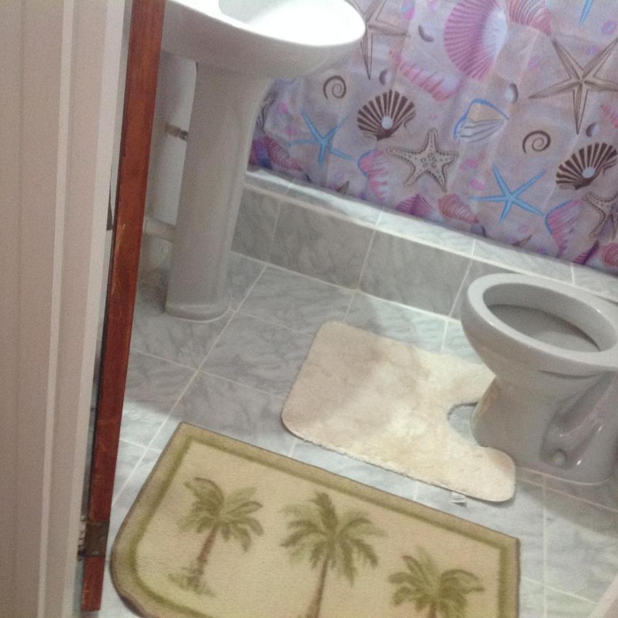 Rainbow Beach Apartments & Rooms Calibishie Esterno foto